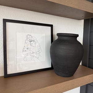 Denise added a photo of their purchase