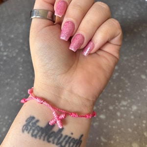 Adrienne added a photo of their purchase