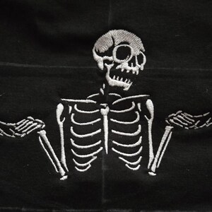 Embroidery: Shrugging Skeleton Design for Download - 4, 5, and 6