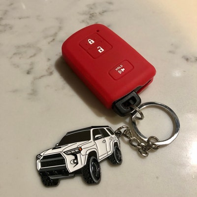 thumbnail image 2 of Black Rubber Key Fob Cover For Toyota (2024-2025) | Protective Skin For Corolla, Tacoma & More | TYOTAG203N 2 of 6