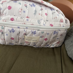 Izabel added a photo of their purchase