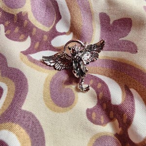 Angelica added a photo of their purchase