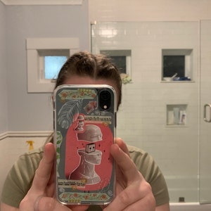 Natalie added a photo of their purchase