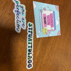 Sarah added a photo of their purchase