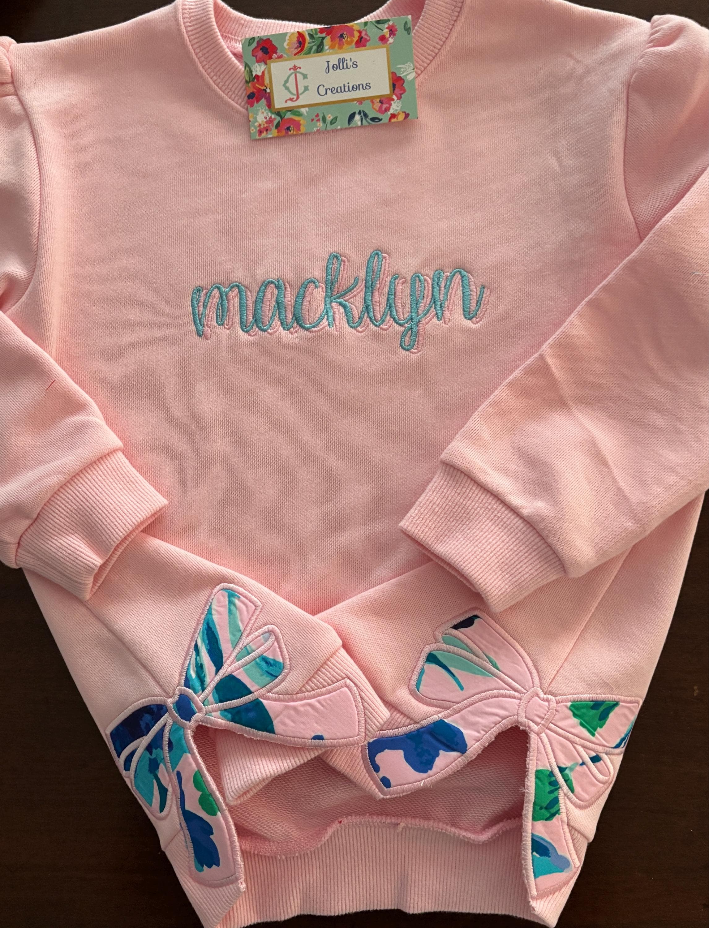 Customer project using Baseball Stitch Side Bow Applique embroidery design