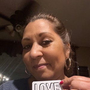 Leticia added a photo of their purchase