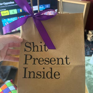 Katie added a photo of their purchase