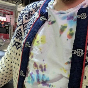 Denis added a photo of their purchase