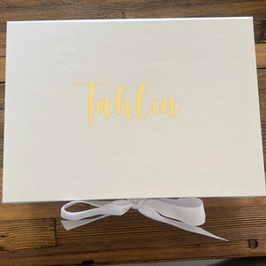 Emma added a photo of their purchase