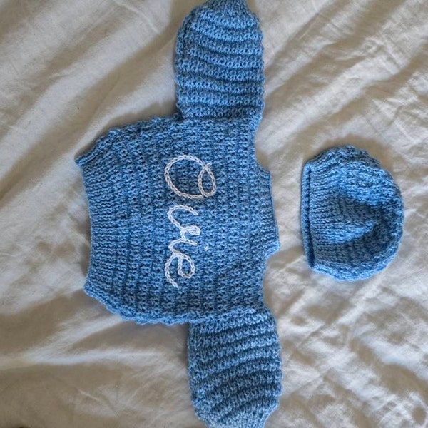 Personalised baby cardigan hand knitted for newborn baby hand