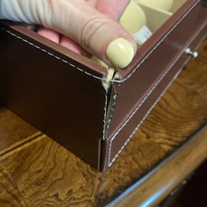 Leslie added a photo of their purchase