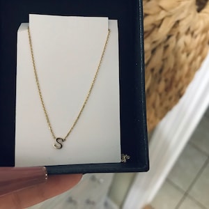 Sasha added a photo of their purchase