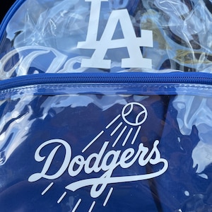 Buy MLB Los Angeles Dodgers Clear Mini-Backpack at Entertainment Earth.  Mint Condition Guaranteed. FREE SHIPPING on eligible …