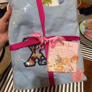 Gena added a photo of their purchase