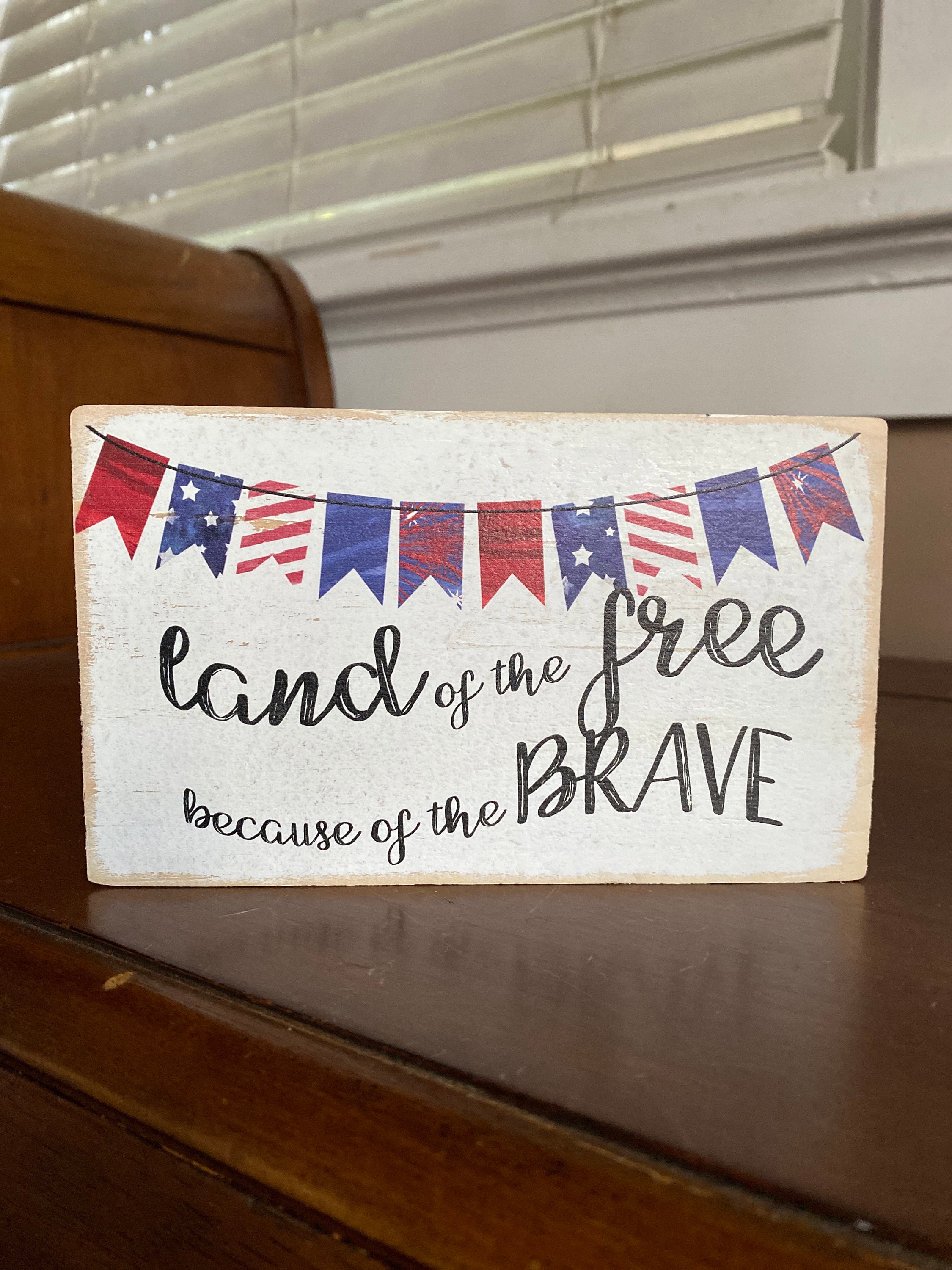 big rustic land of the free because of the brave sign big rustic land of the free because of the brave sign
