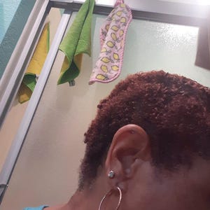 Customer photo from Karen, Dainty Raw Emerald Stud Earrings in Yellow Gold