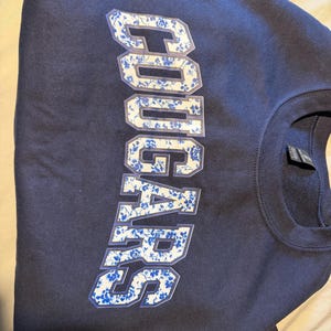 Angela added a photo of their purchase
