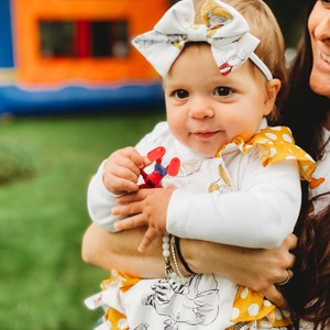 matching bow tie and hair bow