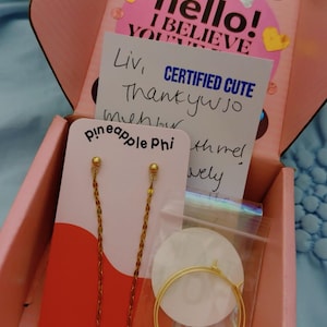 Olivia added a photo of their purchase