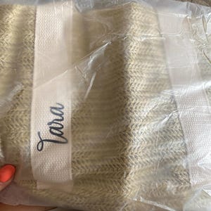 Sarah added a photo of their purchase