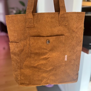 Ale added a photo of their purchase