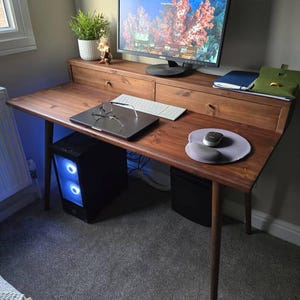 Lewis added a photo of their purchase