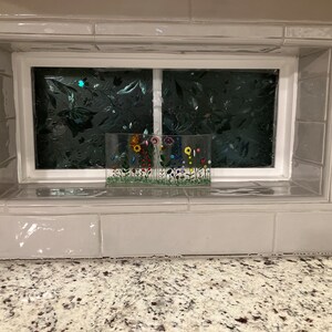 Kathleen added a photo of their purchase