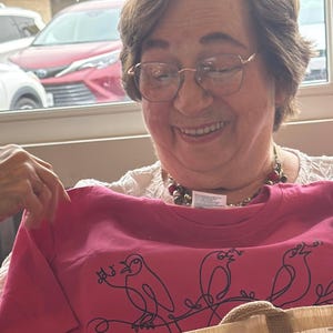 Tina added a photo of their purchase