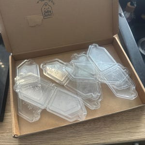 Sharon added a photo of their purchase