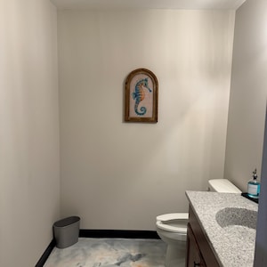 Angela added a photo of their purchase