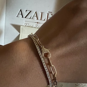 Sarah added a photo of their purchase