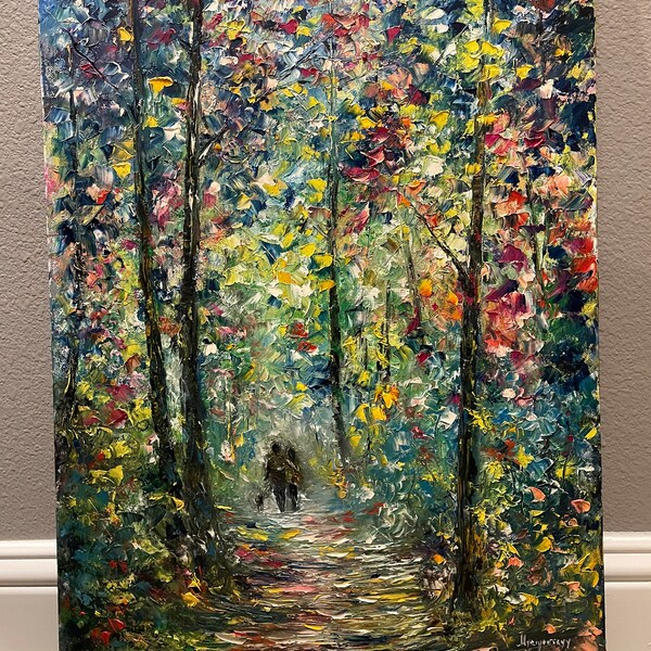Abstract oil painting of holy trinity in golden robes in front of