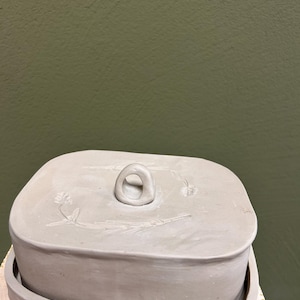 Mihaela added a photo of their purchase