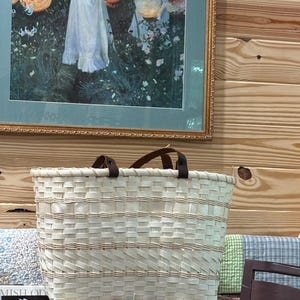 Sandra added a photo of their purchase
