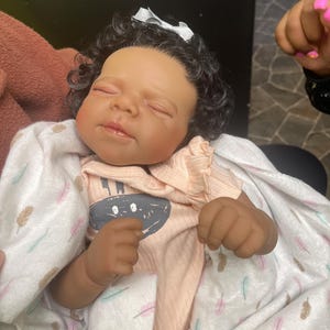 Latoya added a photo of their purchase