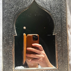 Cristina added a photo of their purchase