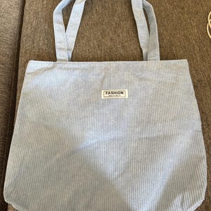 Aly added a photo of their purchase