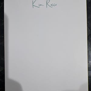 Kim lade till en bild av sitt köp
