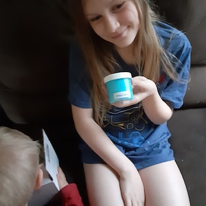 Gina added a photo of their purchase