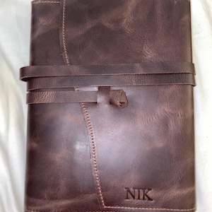 Nikolas added a photo of their purchase