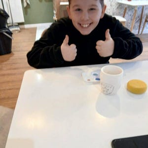 Malika added a photo of their purchase