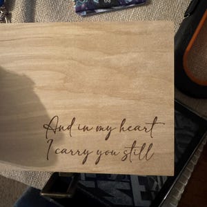 Carrie added a photo of their purchase