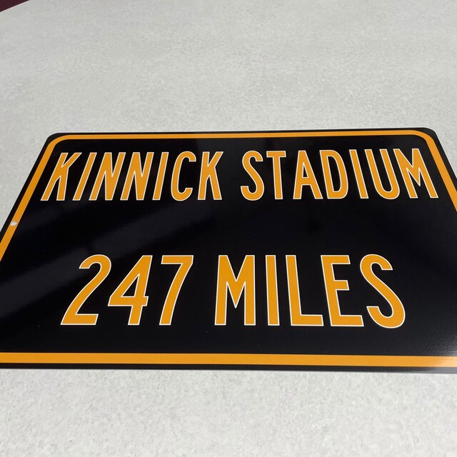 Custom College Highway Distance Sign to Kinnick Stadium Home of