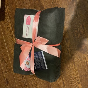 Laura added a photo of their purchase