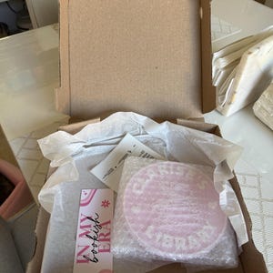 Clarise added a photo of their purchase