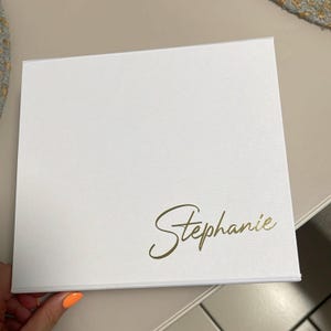 Priscilla added a photo of their purchase