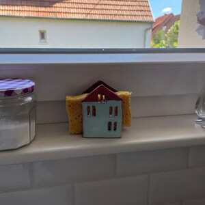 Housset lade till en bild av sitt köp
