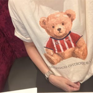 Catherine added a photo of their purchase