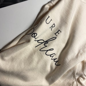 Alexandra added a photo of their purchase