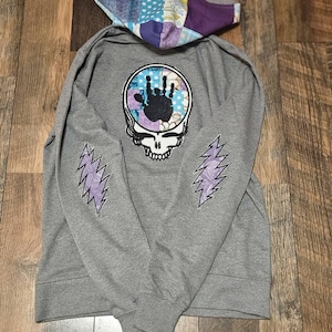 Laurie added a photo of their purchase
